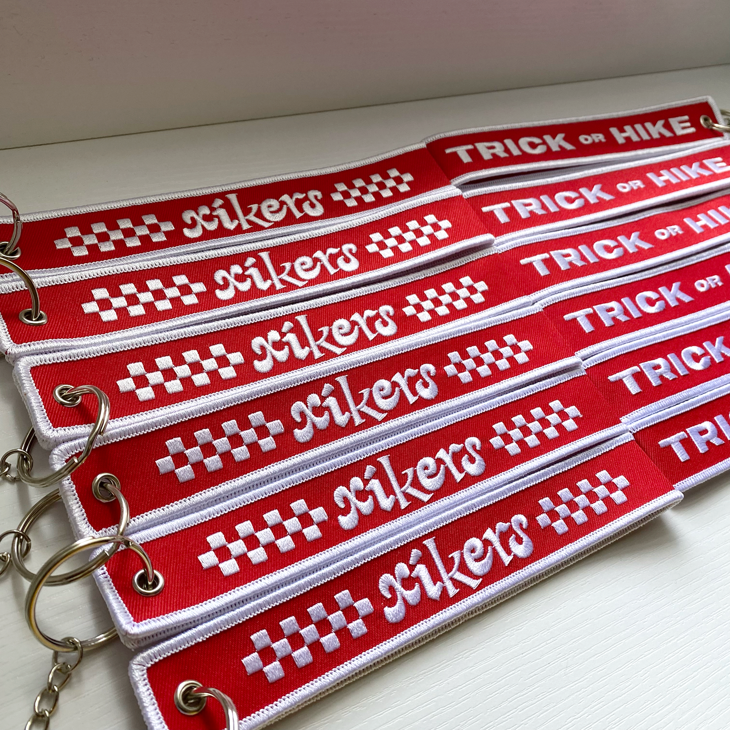 XIKERS Inspired Embroidered Keychain Wristlet
